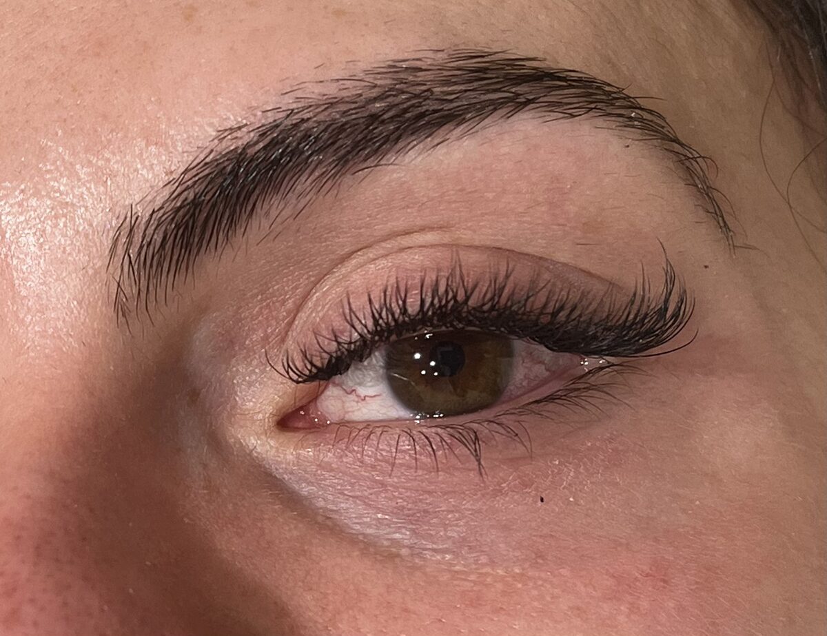 Wispy lash extensions close-up on a client at Urban Brows